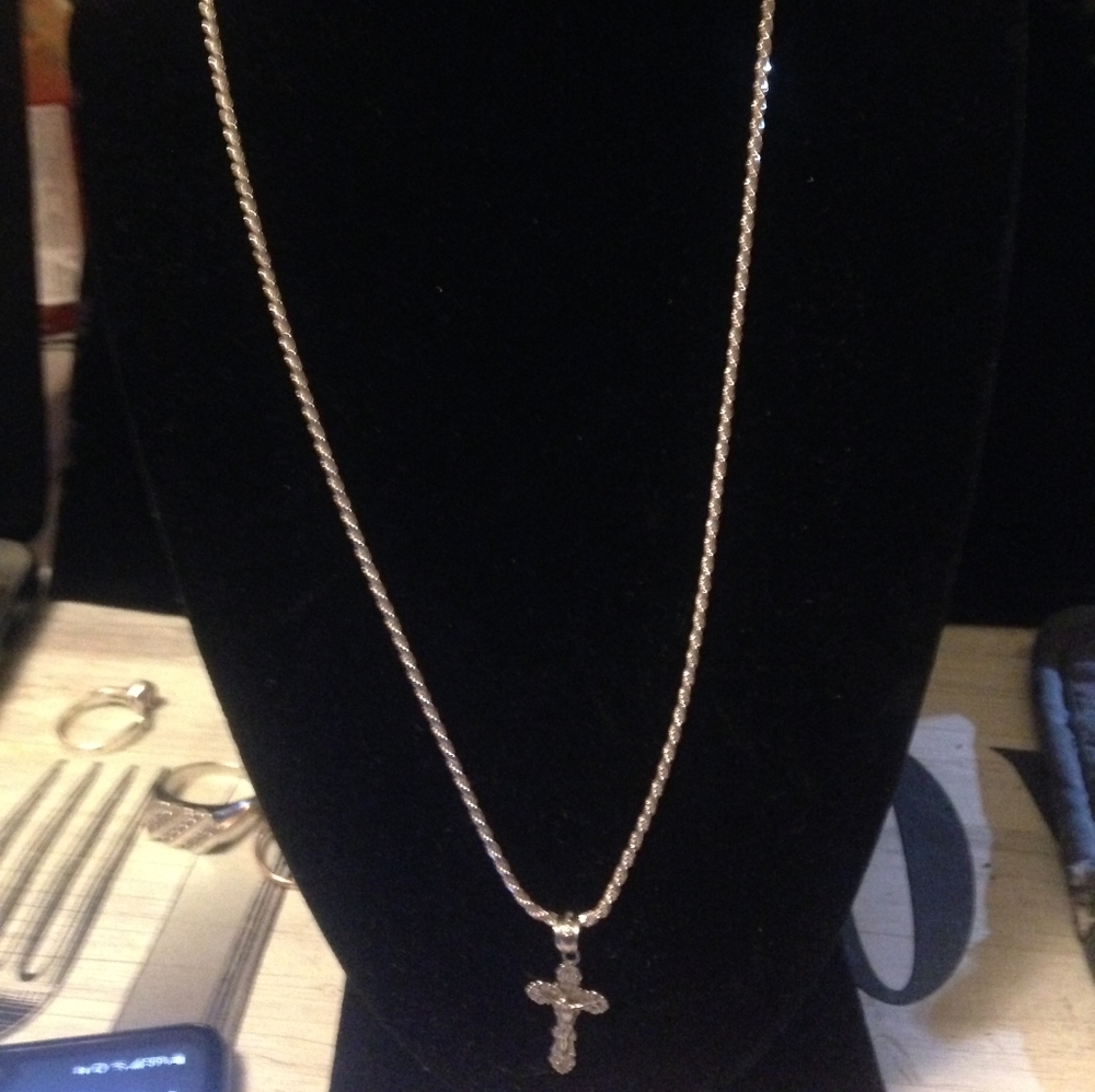 Sterling silver diamond cut with a cross charm
